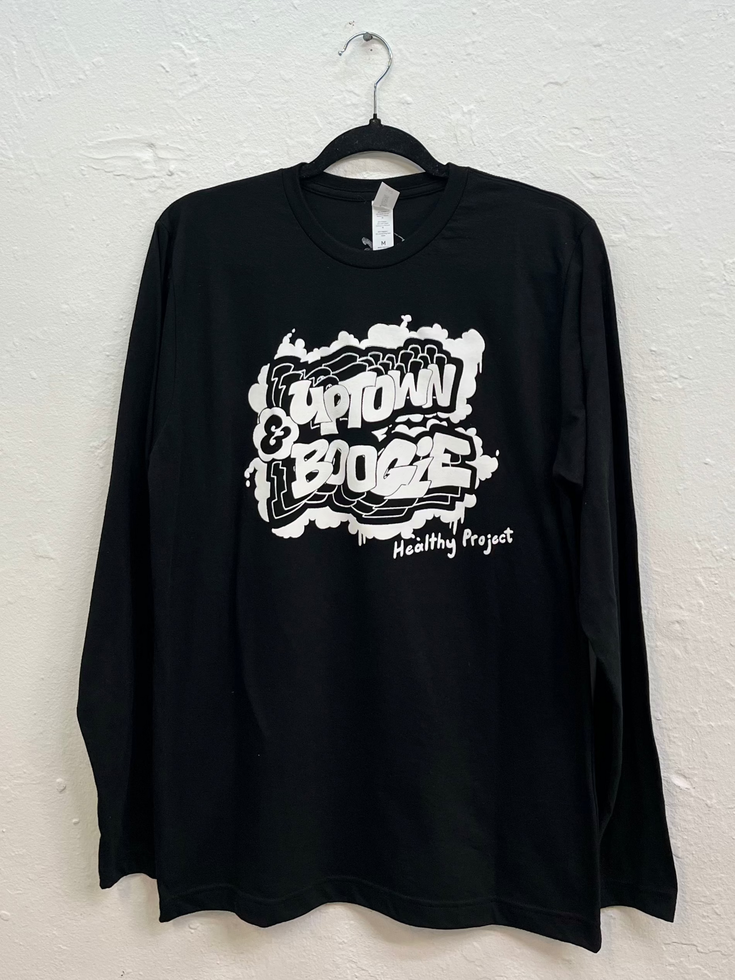 Featuring graffiti version of the logo on the front of the T-shirt