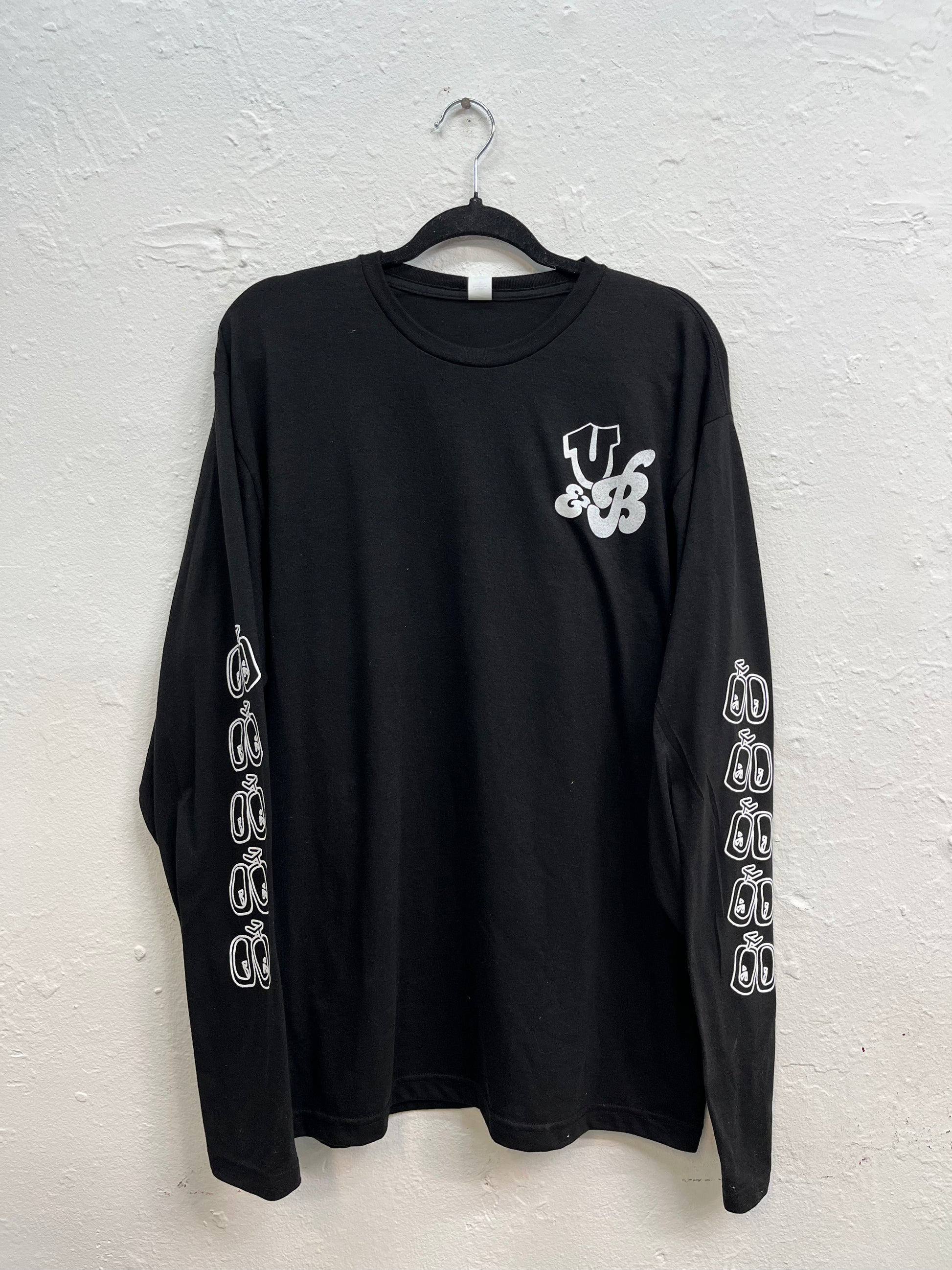 Bicycle pattern printed all over the sleeves, with the U&B initials logo on the top right of the hoodie