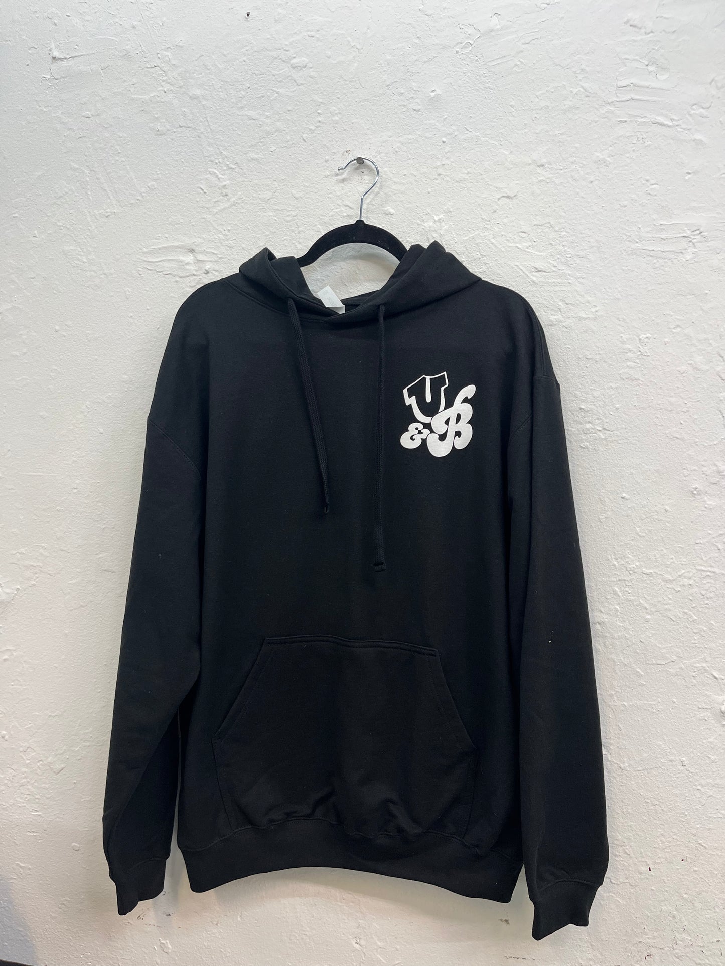 U&B initials logo printed on the top right side of the hoodie